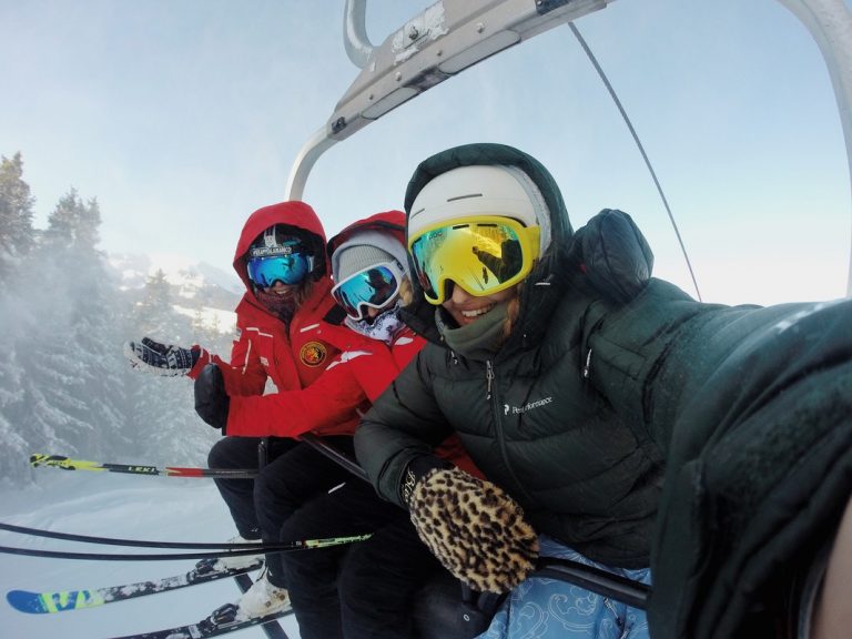 Three smiling people on Mount Baldy Ski Life in Osoyoos