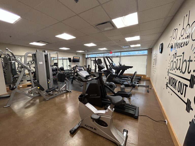 Fitness centre at Watermark Beach Resort in Osoyoos with cardio machines and strength equipment