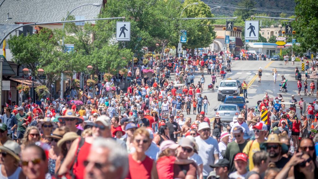 Crowds filling Main Street in Osoyoos during the Cherry Fiesta community parade