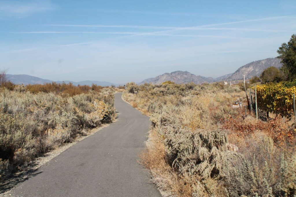 Paved Irrigation Canal Walkway running through sagebrush and shrub-steppe near Osoyoos