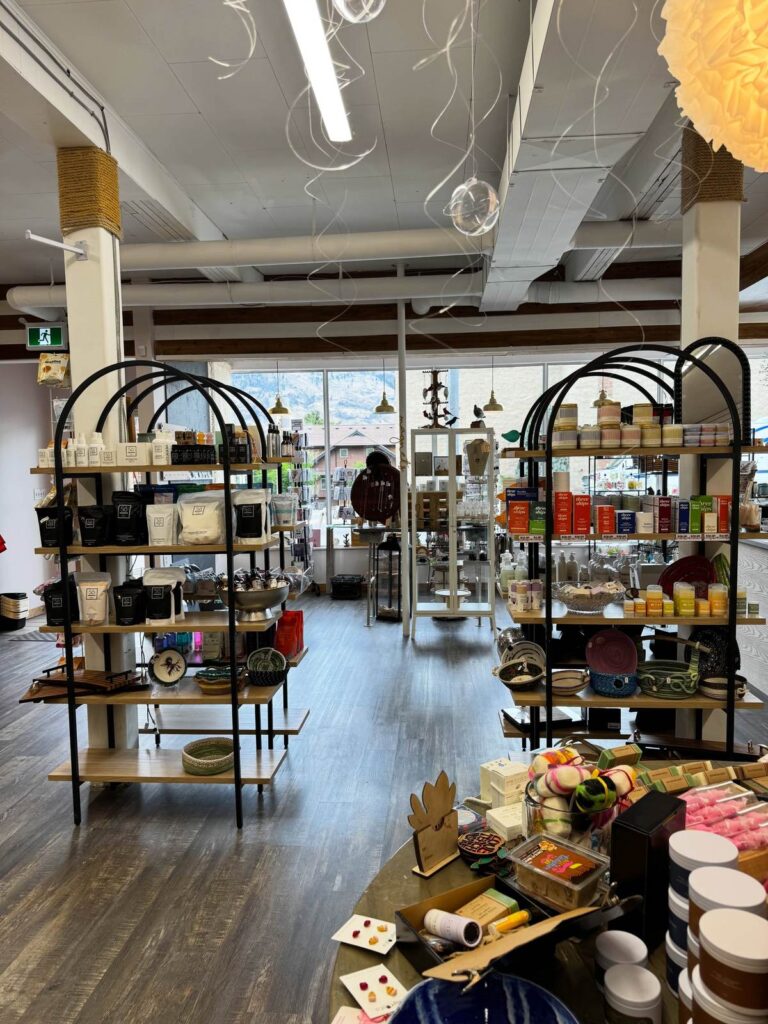 Shelves of home décor, soaps and gifts inside The Quirky Quail artisan shop in Osoyoos