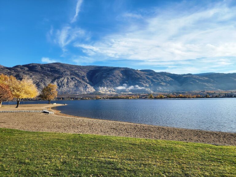 Osoyoos Lake and the surrounding desert hills in golden autumn light