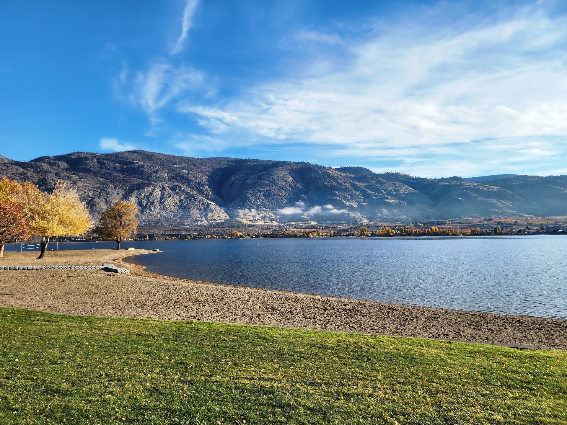 Osoyoos Lake and the surrounding desert hills in golden autumn light